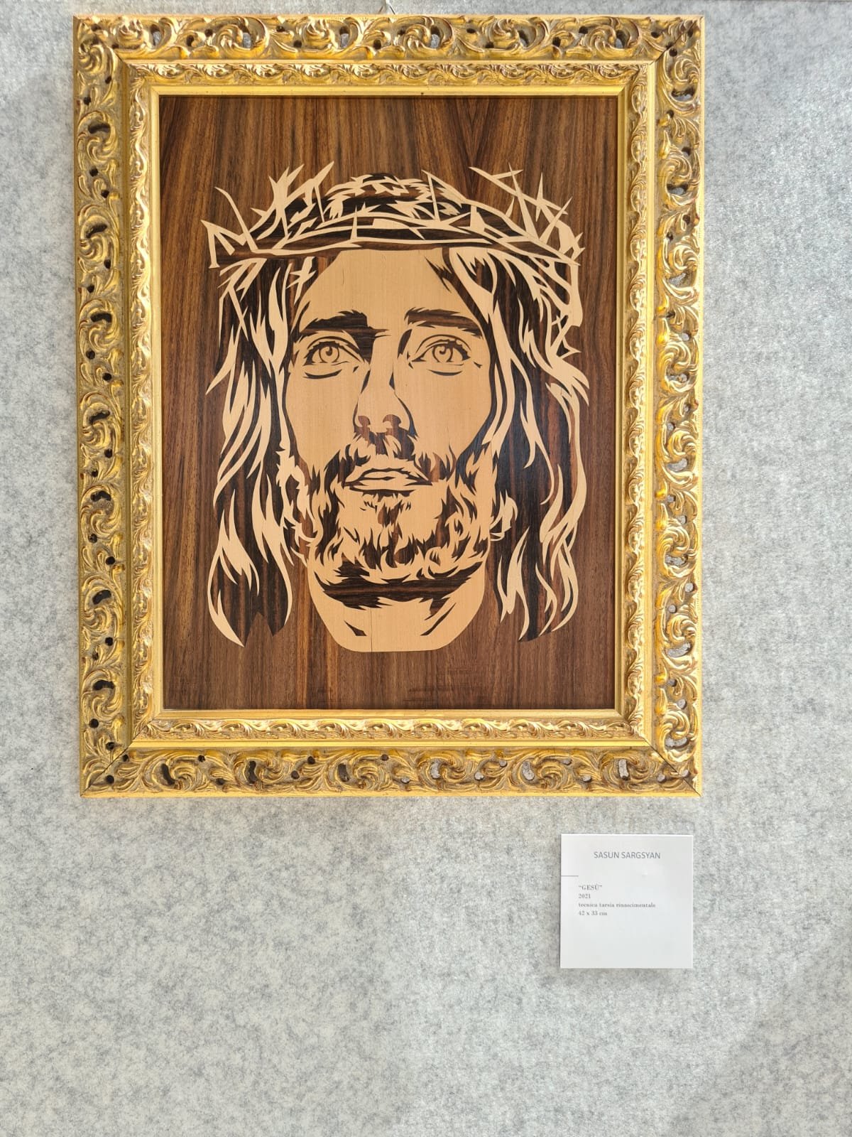 Gesù — marquetry work in the exhibition space