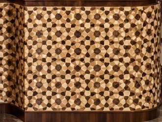 Detail: geometric marquetry on the cabinet front (enhanced image)